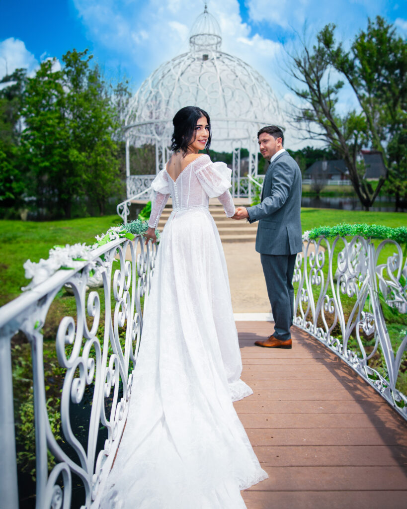 Wedding photographer vs videographer? This photo depicts a couple enjoying their wedding.